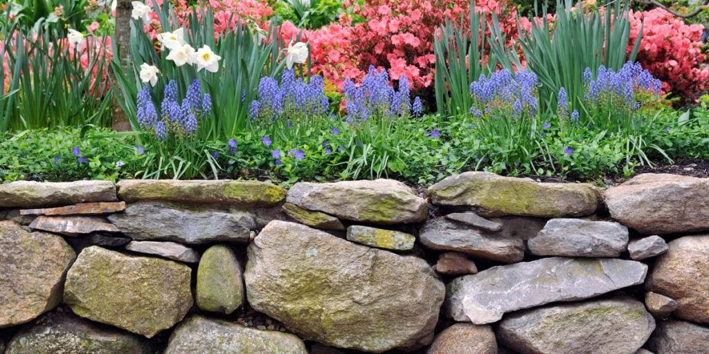 A picture of a rock wall to hold landscaping in Atlanta.